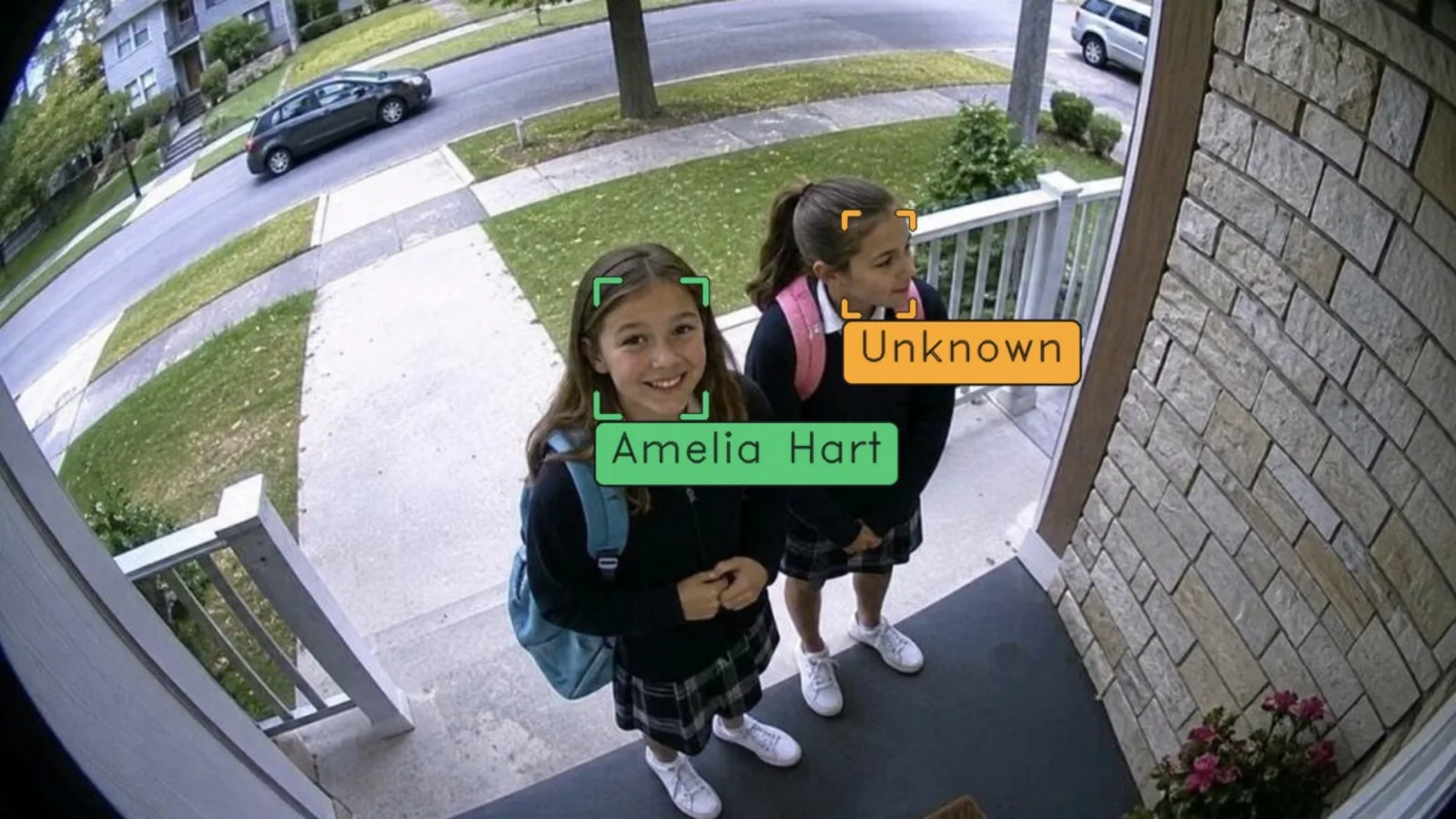 The front door camera during a request: a recognised girl framed in green with her name, her friend in orange as Unknown